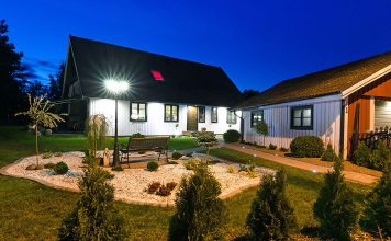 Swedish Villa House with Modern Garden at Night Time