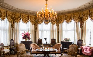 Scandinavian style open-plan kitchen-diner with wood accents